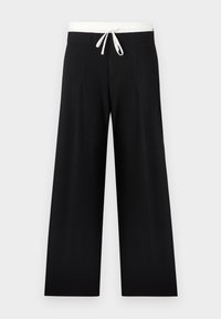 Pantalones negros de pierna ancha con una cinturilla elástica blanca y cordón, con pliegues frontales y una textura suave.