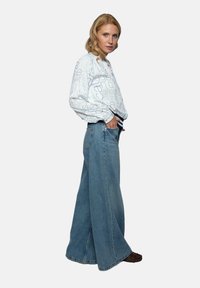 Emily van den Bergh Blouse - white blue letters