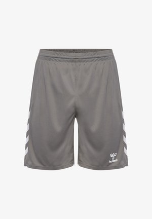 Grijze sportieve shorts met elastische tailleband, witte chevronstrepen aan de zijkanten en een klein wit Hummel-logo op het linkerbeen.