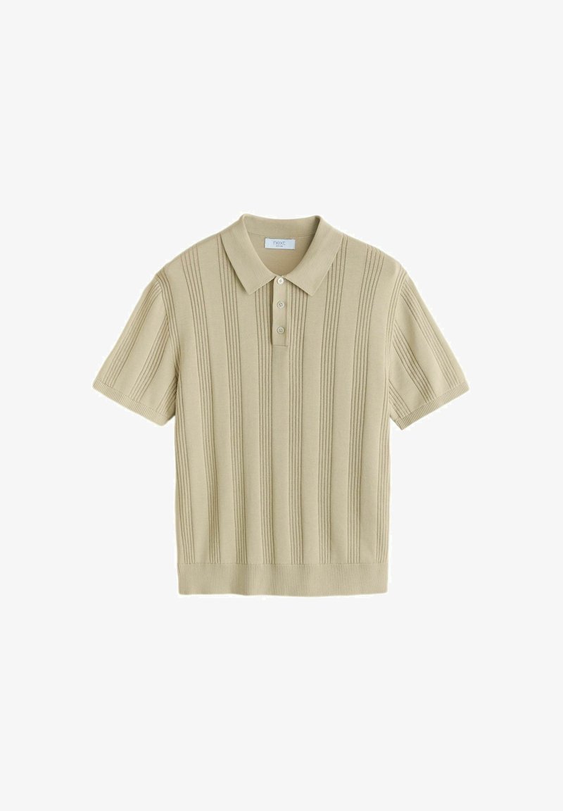 Polo beige a maniche corte con texture a coste, abbottonatura a tre bottoni e righe verticali. Tessuto morbido con vestibilità regolare.
