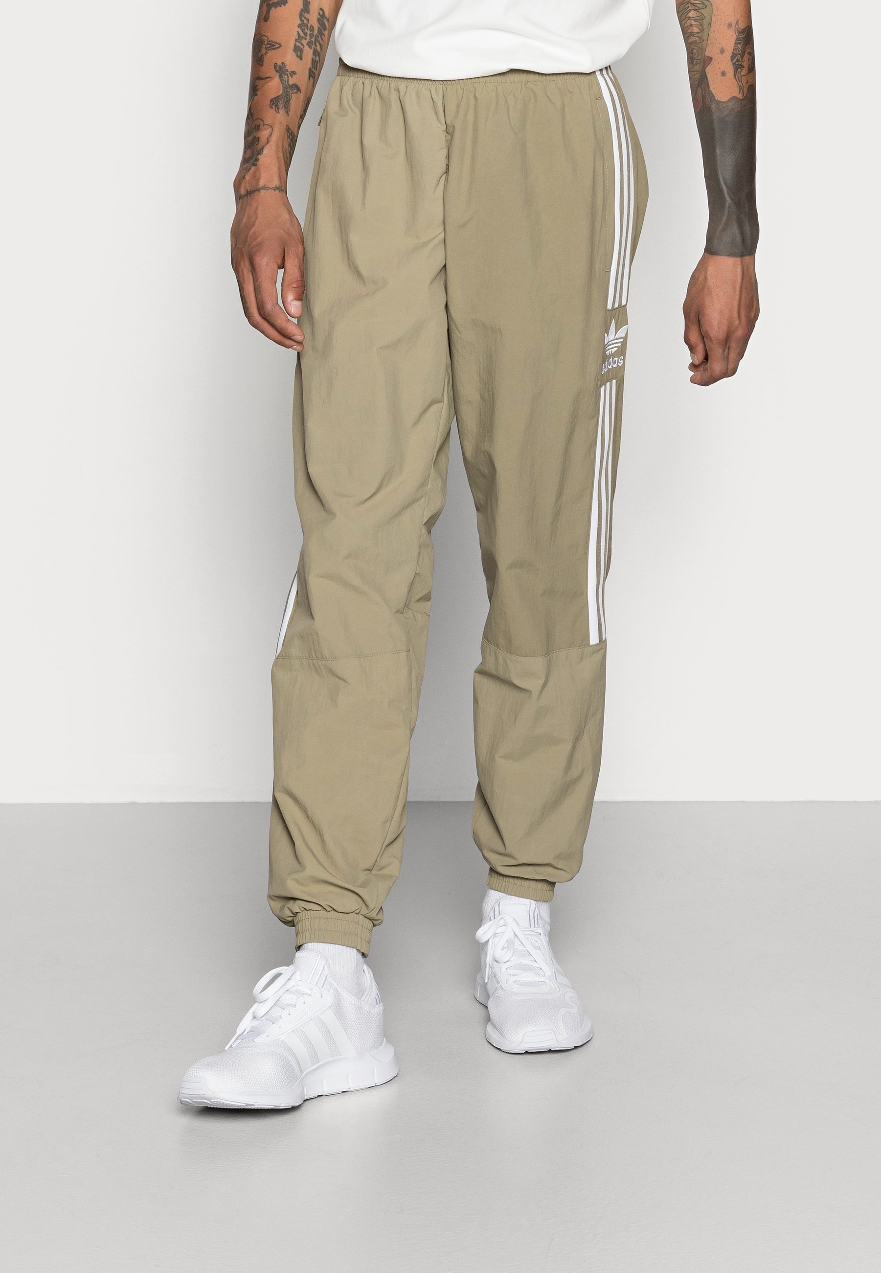 adidas Originals Tracksuit bottoms olive (Pre-owned)
