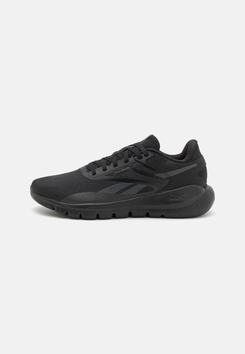 Black athletic shoe with a textured mesh upper, flat laces, and a cushioned sole. Features subtle branding and a sleek, streamlined shape.