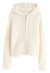 Sweat à capuche zippé couleur crème en tissu doux et duveteux avec une texture côtelée, doté d'une capuche et de manches longues. Design simple sans motifs.