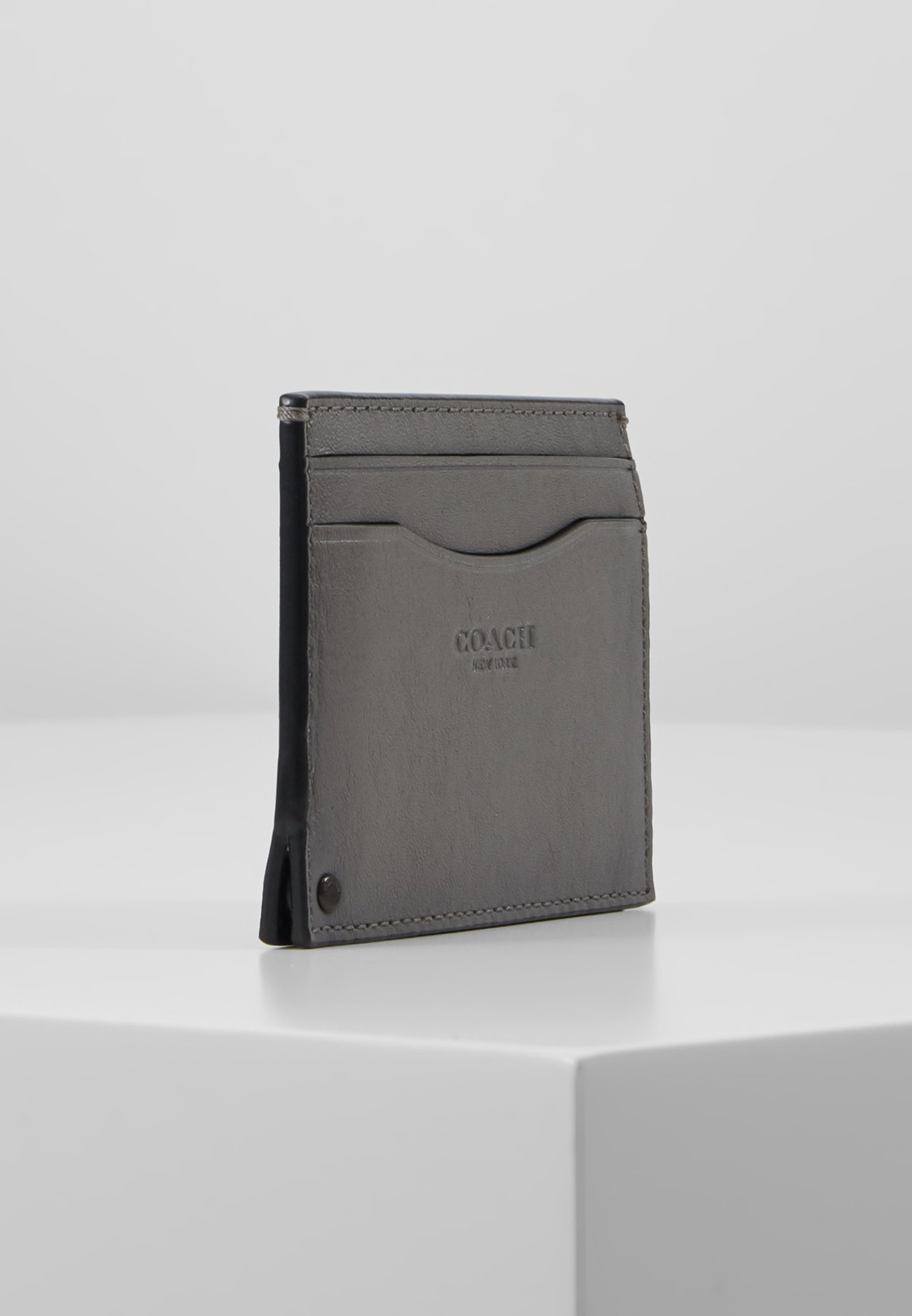 coach swivel card case