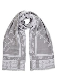 Écharpe grise en tissu doux, présentant un motif répétitif de feuilles sur toute la surface et une bordure de teinte grise plus foncée avec l'inscription "JOOP!".