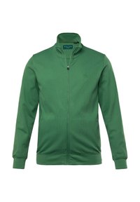 Giacca verde con zip e colletto alto, texture a coste, due tasche laterali e un piccolo logo sul petto. Tessuto morbido e polsini elasticizzati.