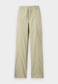 INDULI - Pantaloni - pastel green