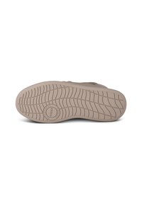 Sula av en sneaker i ljusbeige med ett texturerat gummimönster, med en central cirkellogo märkt "Scandinavian Sneakers."