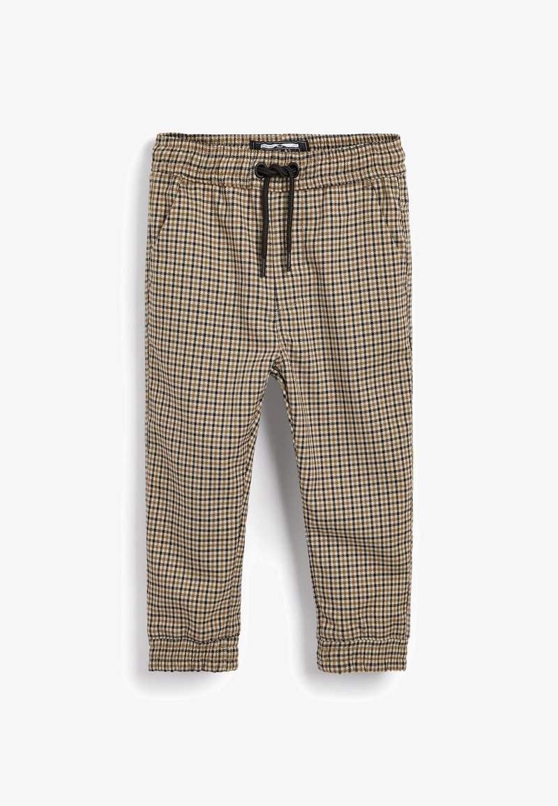 Pantalon à carreaux marron, noir et blanc avec taille élastique et cordon de serrage noir, chevilles resserrées et poches latérales.
