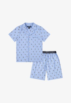 Completo pigiama in cotone blu chiaro composto da maglietta a maniche corte con taschino e pantaloni corti a fantasia, entrambi decorati con piccoli loghi di cavallo.