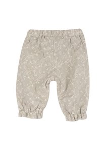 Pantalons en coton gris clair avec taille élastique et poignets froncés, ornés d'un motif floral blanc de feuilles et de petites fleurs.
