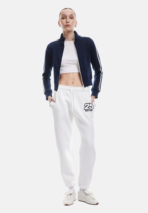 JOGGER - Trainingsbroek - beige
