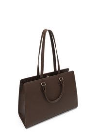 Brown leather tote bag with two long handles, a rectangular shape, textured surface, and metallic accents on the handles.