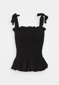 Mustassa smokkatussa peplum-topissa on säädettävät hihnat, pyöreä pääntie ja röyhelöhelma. Se on valmistettu pehmeästä, teksturoidusta kankaasta.