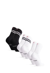 Cuatro pares de calcetines de tripulación: dos negros con rayas blancas y dos blancos con rayas negras, con textura acanalada y detalles de logo.