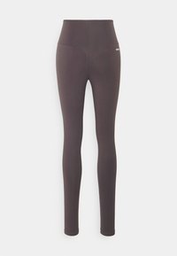 High-waisted legging in dark brown fabric. Smooth texture, stretchy material, featuring minimal branding on the back.
