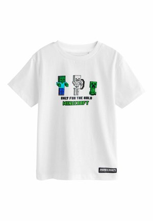 Fehér pamut póló pixeles Minecraft karakterekkel, többek között egy zombival, csontvázzal és creeperrel, valamint a "CSAK A BÁTRAKNAK" felirattal.