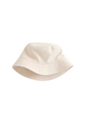 Chapeau bob beige en coton avec des détails cousus et un bord incliné vers le bas, présenté sur fond blanc.