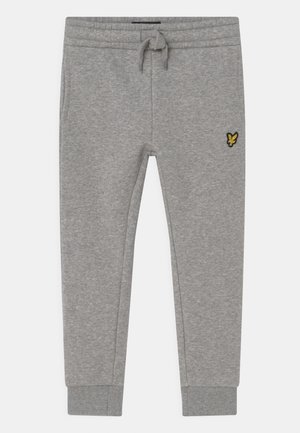 Grijze sweatpants van zachte stof met een elastische tailleband, koord en geribbelde manchetten. Bevat een klein geel logo op de dij.
