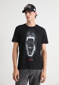 HUGO DAYAKING - T-shirt med print - black