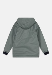 Petit Bateau JUNIOR CIRE UNISEX - Regnjakke - thuya