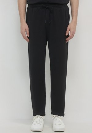 Calliope GINNICO - Jogginghose - nero