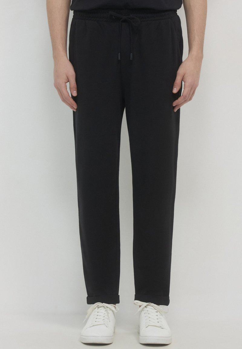 Calliope GINNICO - Jogginghose - nero