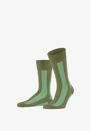 Paar mid-calf Socken in Olivgrün mit hellgrünen vertikalen Einsätzen, gerippten Bündchen und verstärkten Zehen und Fersen.