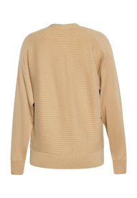 Beige geribde trui met een ronde halslijn, lange mouwen en een gestructureerde stof. Heeft een relaxte pasvorm en een horizontaal streepjespatroon.