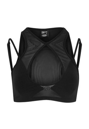 Black sports bra with a mesh design and a cut-out back. Features adjustable thin straps and a round neckline. Smooth texture.