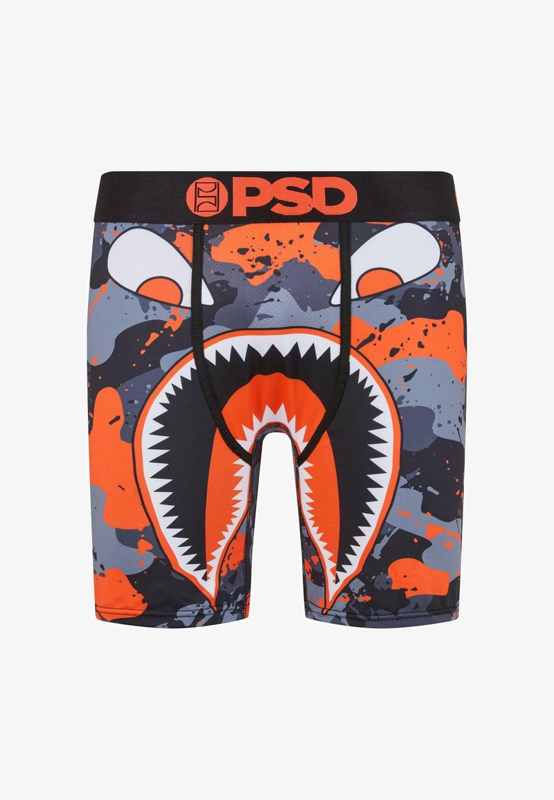 Černé boxerky s odvážnou grafikou otevřených úst s ostrými zuby, doplněné oranžovými a šedými skvrnami, a se značkovým pasem.