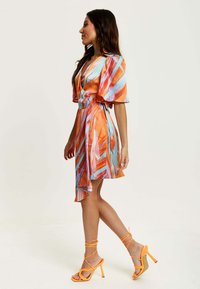 Liquorish MINI ABSTRACT PRINT WRAP  - Day dress - orange