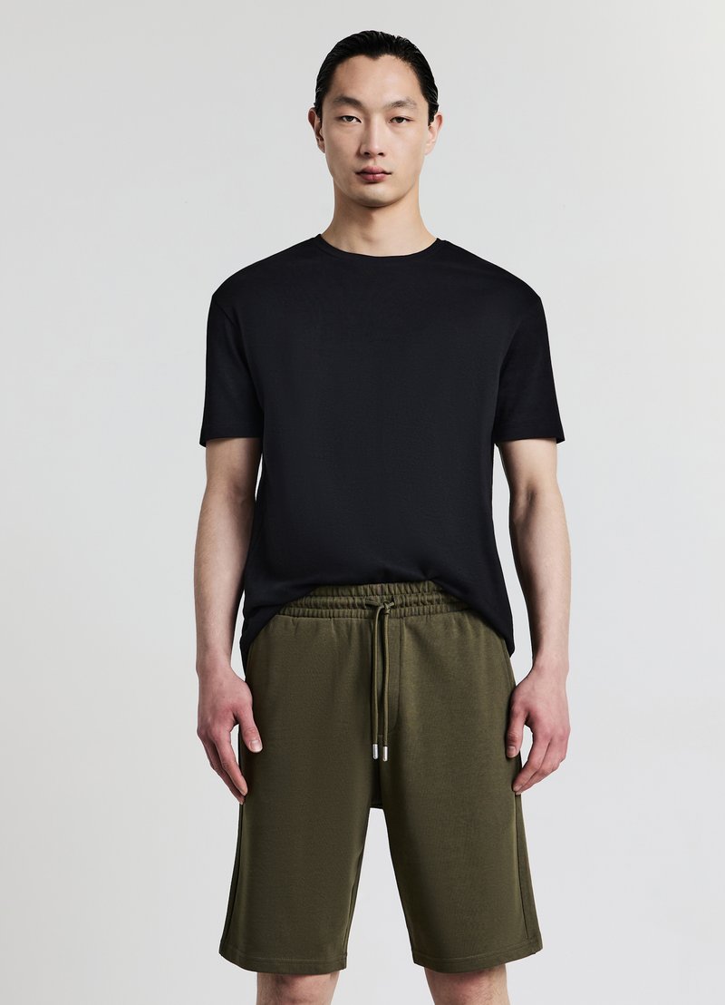 Calliope GINNICO - Pantalon de survêtement - verde militare