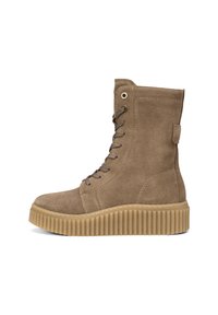 Bottes montantes en daim marron avec une surface textur�ée, bout rond, lacets à l'avant et semelle en caoutchouc épaisse et striée.