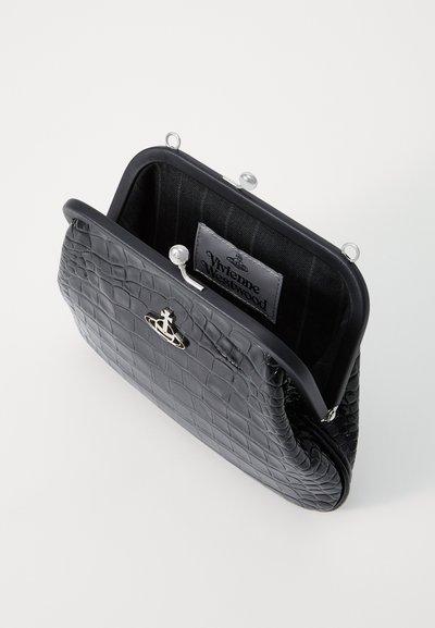 Black crocodile-embossed leather handbag with a metal clasp, featuring a lined interior and a visible brand label.