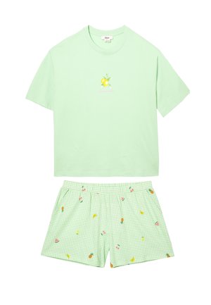 Light green short-sleeve shirt with lemon graphic and matching light green shorts patterned with small fruits and flowers.