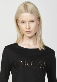 Koroshi Hosszú ujjú felső - black