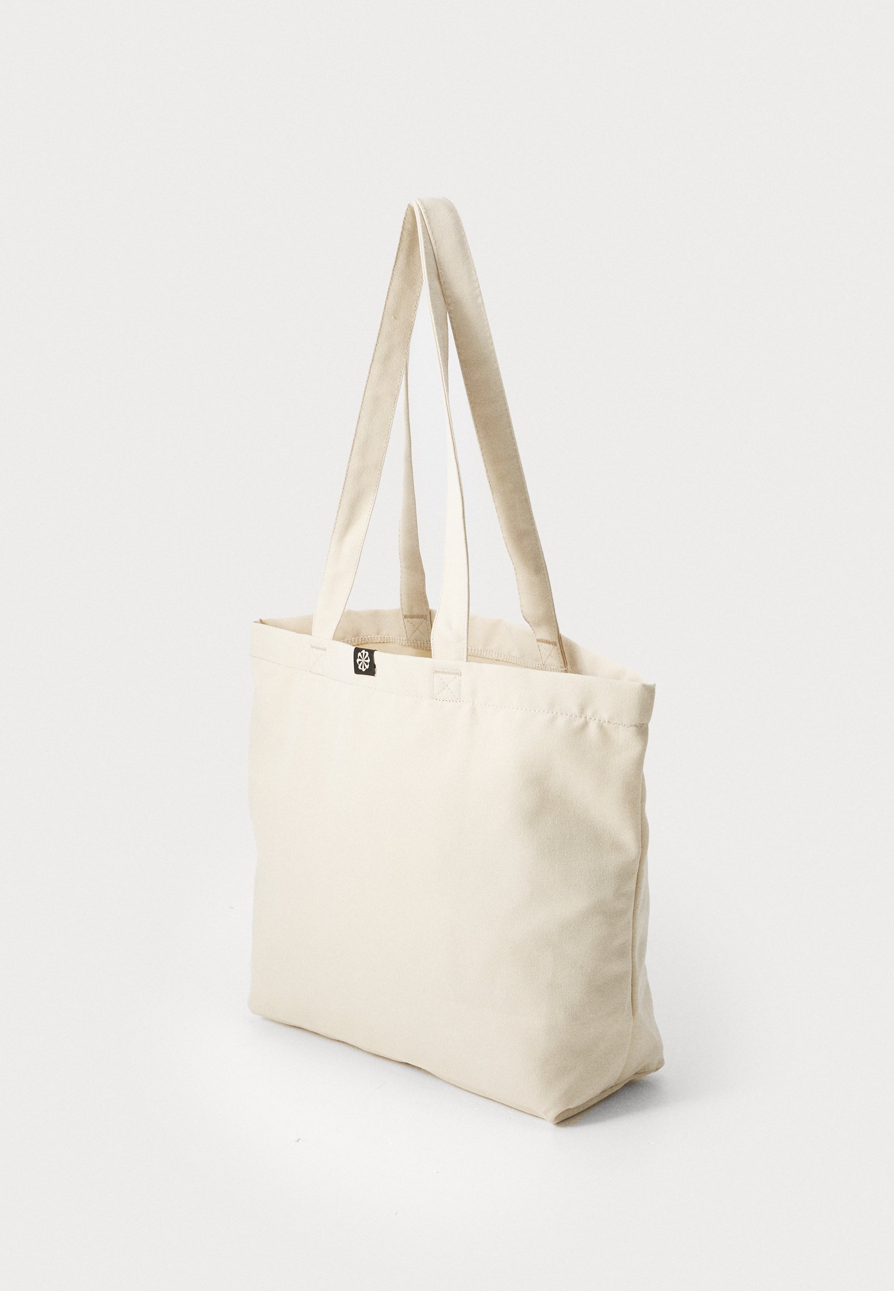 nike cream tote bag