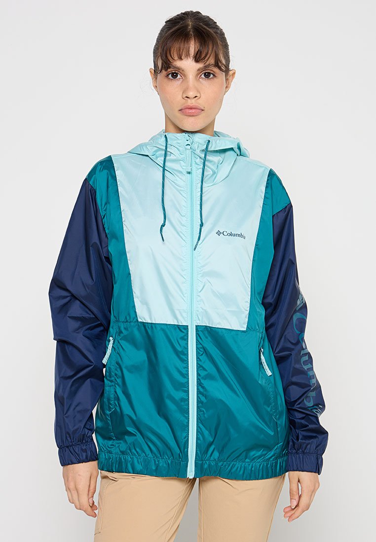 Leichte, kapuzenjacke in Teal und Marineblau. Mit einem Frontreißverschluss, elastischen Bündchen und Logodetails. Glatte Textur und Kontrastpanels.