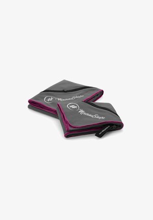 Gray fabric yoga mat with pink zippers and accents, featuring the "#NirvanaShape" logo in white. Folded design for easy storage.