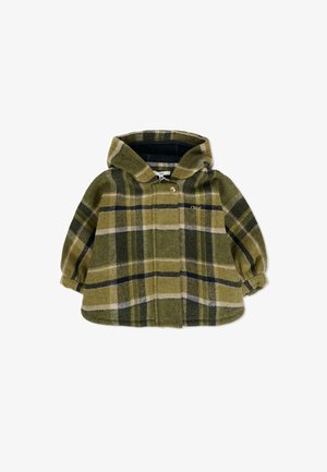 Veste en flanelle à carreaux dans des tons de vert, avec une capuche, un ourlet arrondi et une fermeture à boutons. Contient des accents blancs et marine dans le motif.