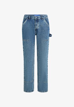 Blue denim jeans with a straight leg design, featuring contrasting patches, two front pockets, and a visible loop detail on the side.