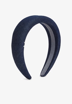Fascia per capelli imbottita in tessuto blu navy con superficie leggermente strutturata e morbida fodera interna a righe.