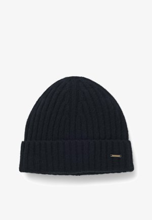 Mörk marinblå stickad mössa av mjuk ull, med ribbat mönster och en vikbar kant med en metallisk detalj.