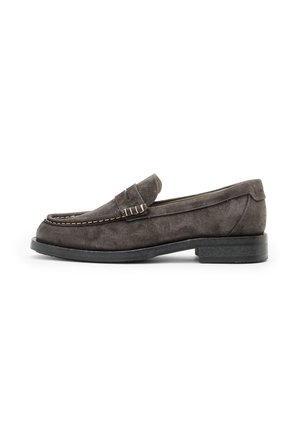 Gray suede loafers with a low block heel, detailed stitching, and a textured leather strap across the front. Classic slip-on design.