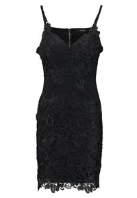 Robe en dentelle noire à bretelles fines, avec un motif en dentelle florale, coupe ajustée et ourlet festonné. Fermeture à glissière au dos.