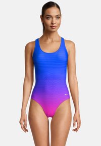 Eénstuk zwempak in een gradient van blauw naar roze met een stippenpatroon. Heeft dikke banden en een hoge uitsnijding bij de benen.