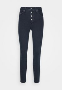Smal mörkblå denimjeans med hög midja, femknäppning och traditionella fickor. Slät textur med minimala detaljer.