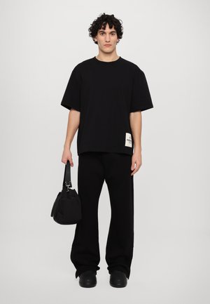 NEOPRENE PATCH ELASTICATED TROUSERS UNISEX - Pantaloni sportivi - black