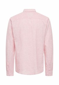 Chemise homme rose clair à manches longues avec poignets boutonnés, col et ourlet droit, vue de dos.